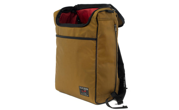 The Cambiata in Coyote (sand brown) Ballistic with Sangria (red with light red grid) 210 Cerylon interior.